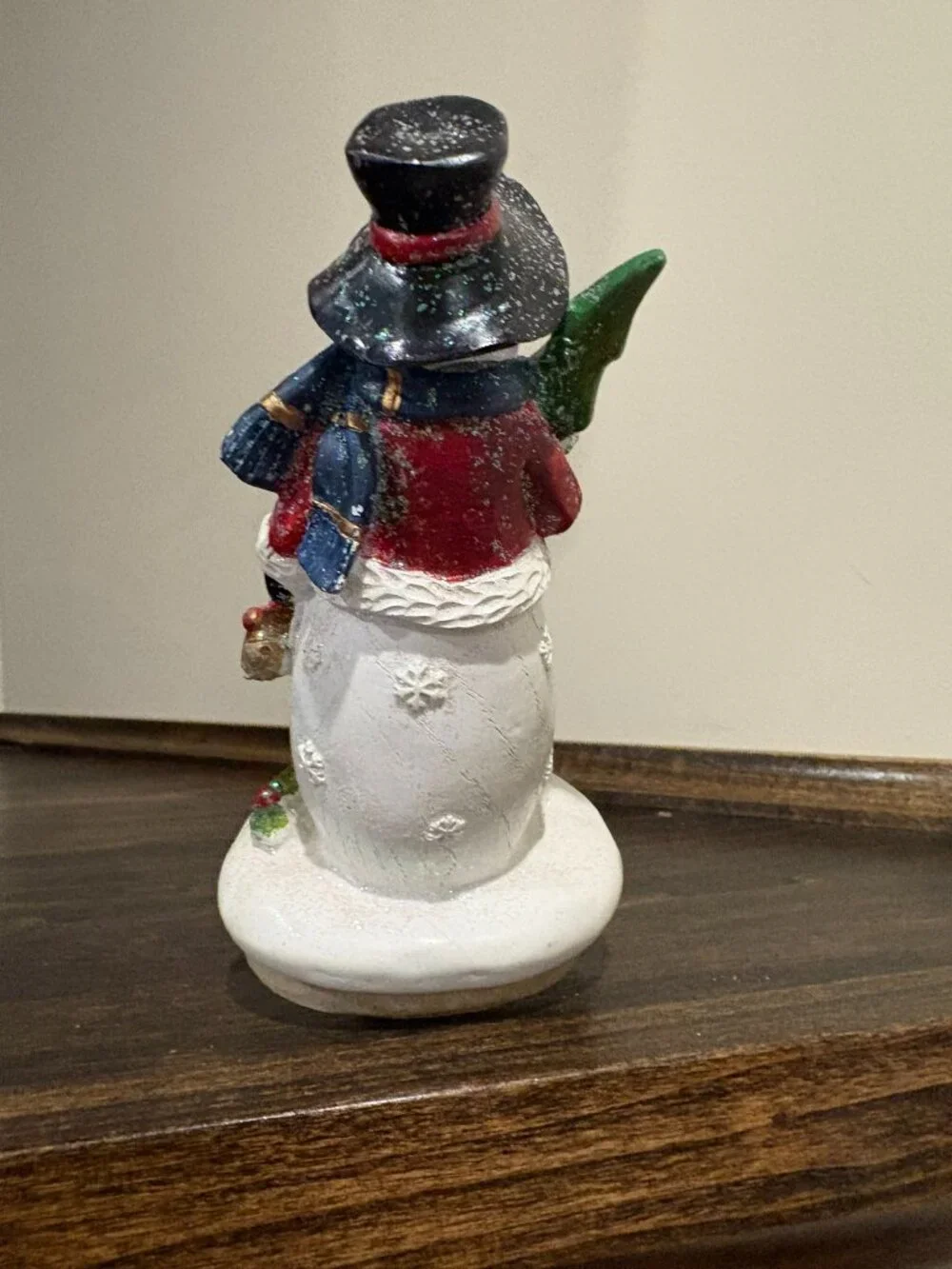 Vintage cast iron stocking holder, Snowman holding a tree, jaunty hat